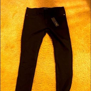 Ci Soni black stretch pants with zipper. New with tags